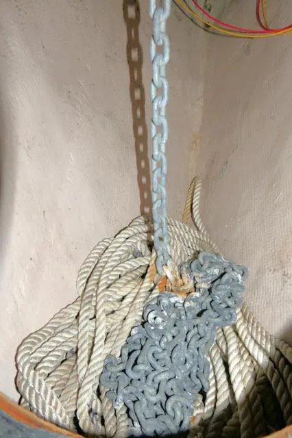 Slide: The Image of Coiled rope and chain in a 1976 Choate Custom 38 sailboat. - 47