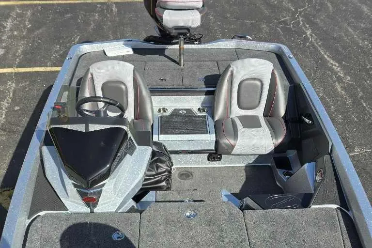 Slide: The Image of 2024 Ranger Z518 Ranger Cup Equipped boat interior with dual seats and steering console. - 3