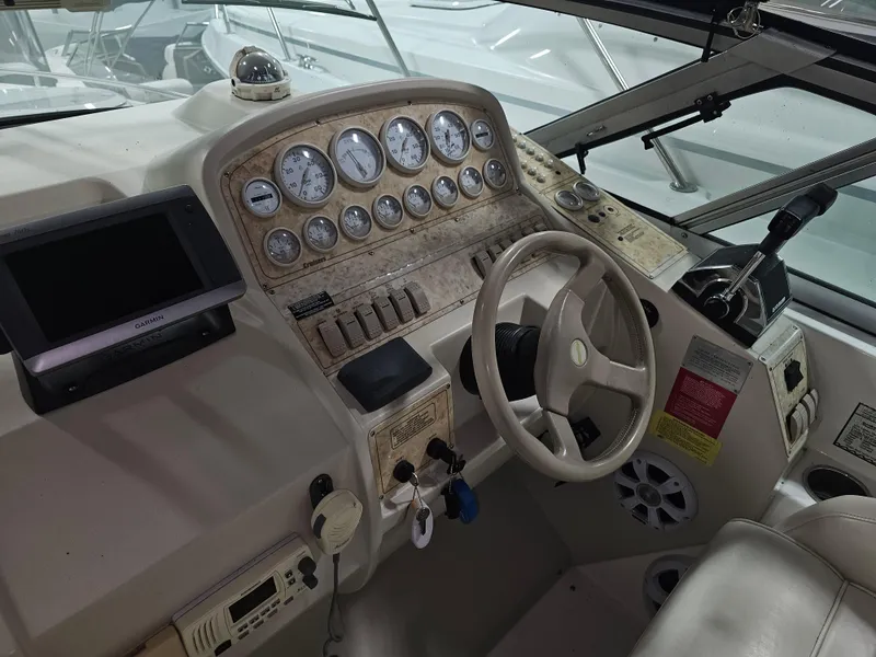 Slide: The Image of Interior view of a 1997 Cruisers Yachts 3120 Aria cockpit. - 11