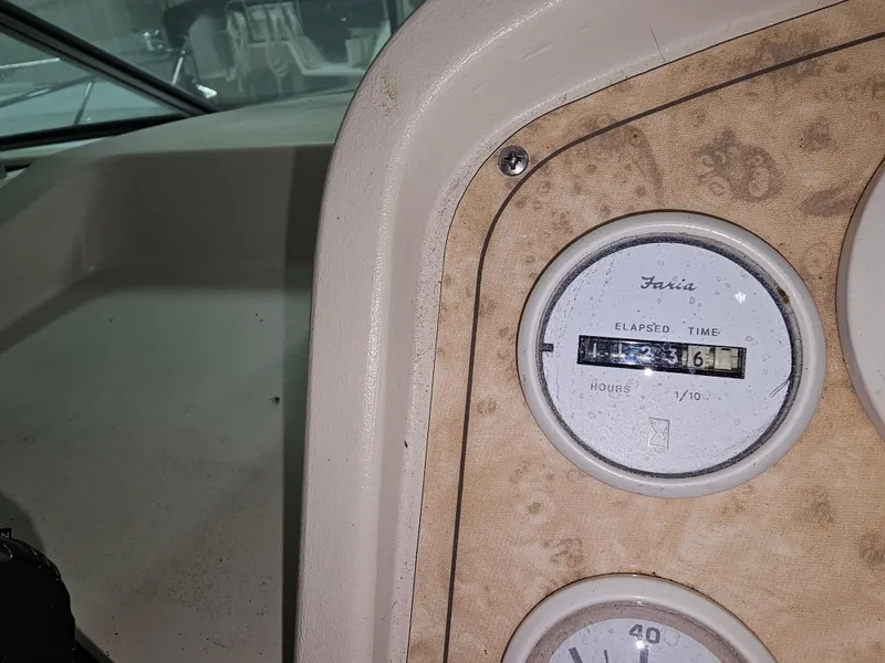 Slide: The Image of 1997 Cruisers Yachts 3120 Aria dashboard with hour meter. - 16