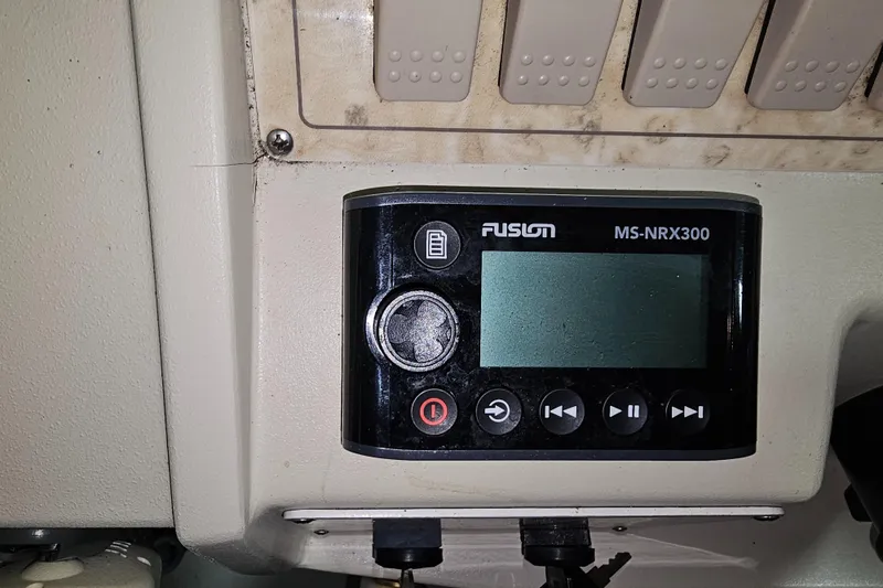 Slide: The Image of Fusion MS-NRX300 control panel on 1997 Cruisers Yachts 3120 Aria. - 23