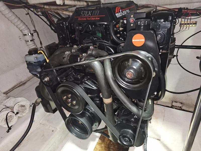 Slide: The Image of Engine of a 1997 Cruisers Yachts 3120 Aria boat in the engine room. - 32