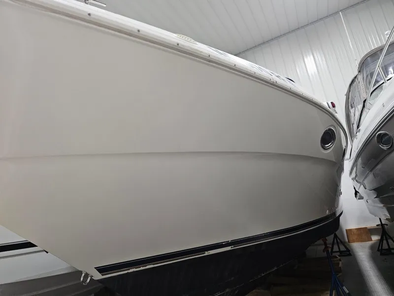Slide: The Image of 1997 Cruisers Yachts 3120 Aria in storage facility, side view. - 36