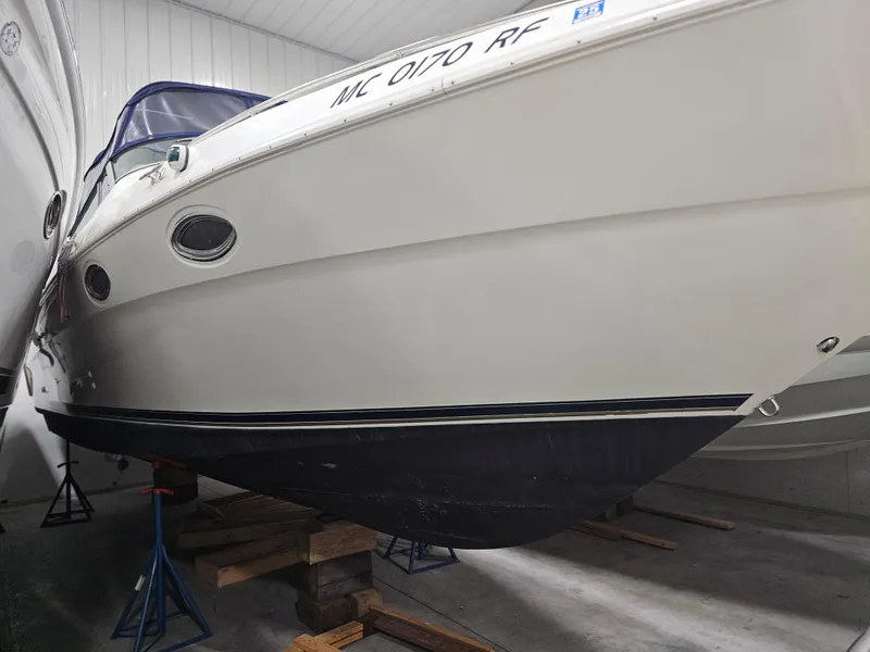 Slide: The Image of 1997 Cruisers Yachts 3120 Aria in storage, side view. - 37