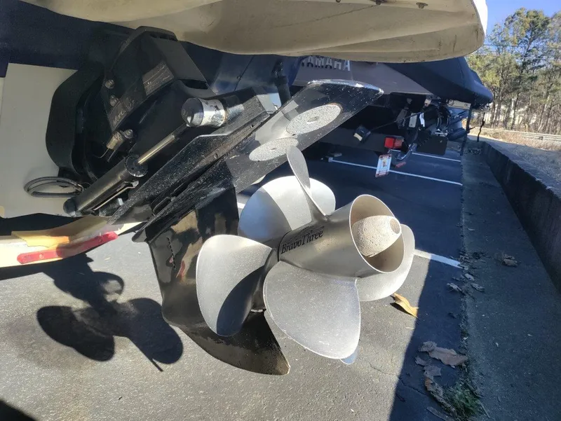 Slide: The Image of Close-up of 2005 Sea Ray 240 SD boat propeller in a parking lot. - 3