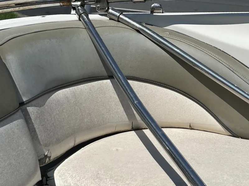 Slide: The Image of Interior seating of a 2005 Sea Ray 240 SD boat with metal railings. - 7