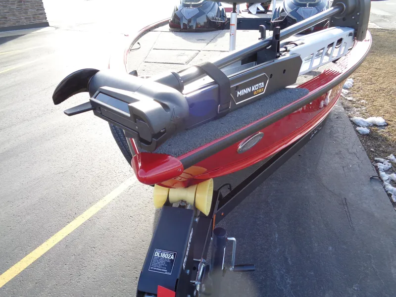 Slide: The Image of 2024 Lund 1875 Pro-V Bass boat with Minn Kota motor on trailer. - 17