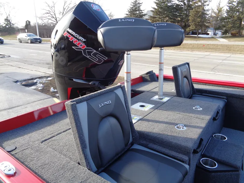Slide: The Image of 2024 Lund 1875 Pro-V Bass boat with Mercury Pro XS engine, rear seating view. - 19