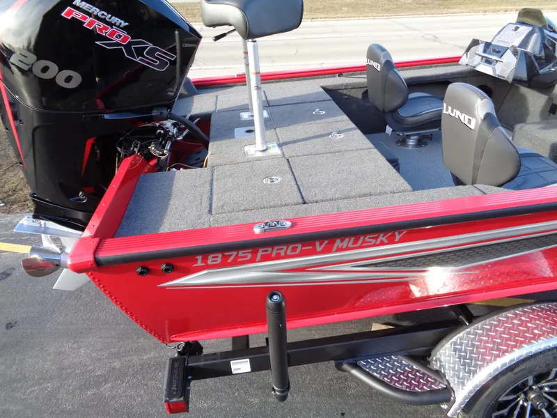 Slide: The Image of 2024 Lund 1875 Pro-V Bass boat with Mercury 200 Pro XS engine. - 3