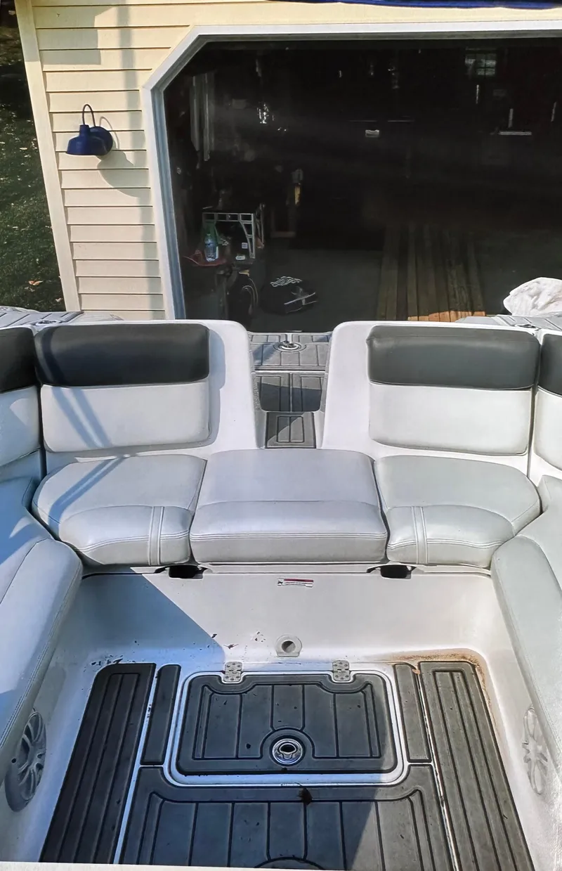 Slide: The Image of 2006 Yamaha Boats SX 230 interior seating and deck view. - 10