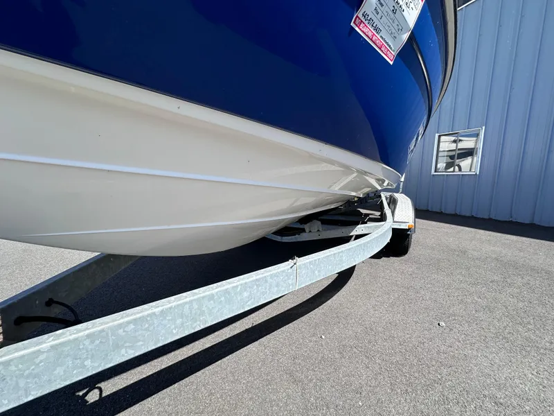 Slide: The Image of 2006 Yamaha Boats SX 230 on trailer, close-up view of hull and trailer. - 7