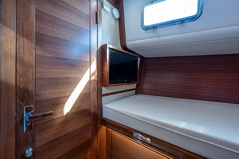 Slide: The Image of Crew Berth, TV, door to head on left - 60