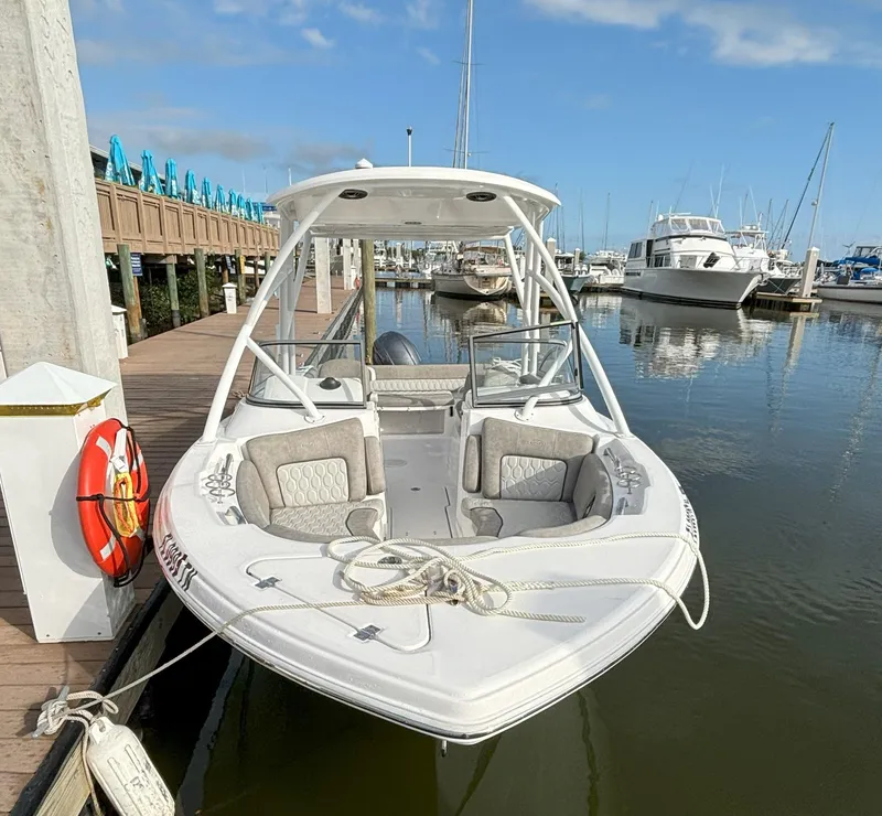 Slide: The Image of 2023 Sea Fox 226 Traveler docked at marina with clear skies. - 5