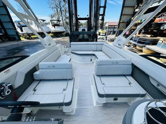 Slide: The Image of 2024 Sea Ray 270 SDX boat interior with spacious seating and modern design. - 22