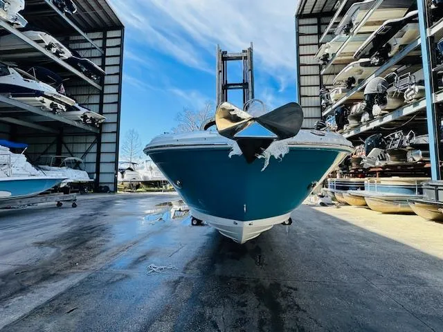 Slide: The Image of 2024 Sea Ray 270 SDX boat in storage facility. - 3