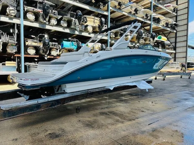 Slide: The Image of 2024 Sea Ray 270 SDX boat in storage facility. - 6