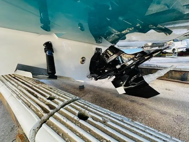 Slide: The Image of 2024 Sea Ray 270 SDX boat stern drive and propeller detail. - 7
