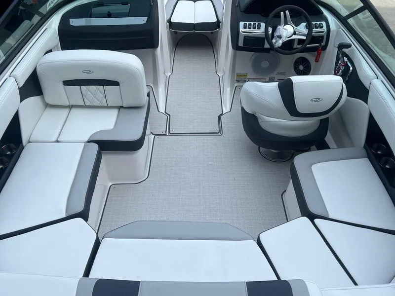 Slide: The Image of 2024 Regal 2000 ES boat interior with white and gray seating. - 15