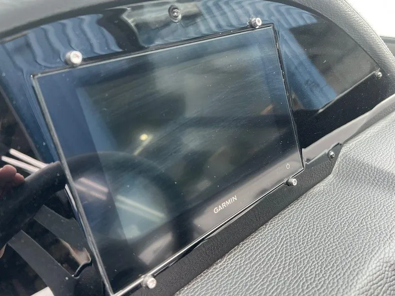 Slide: The Image of Garmin navigation system in 2024 Regal 2000 ES boat dashboard. - 9