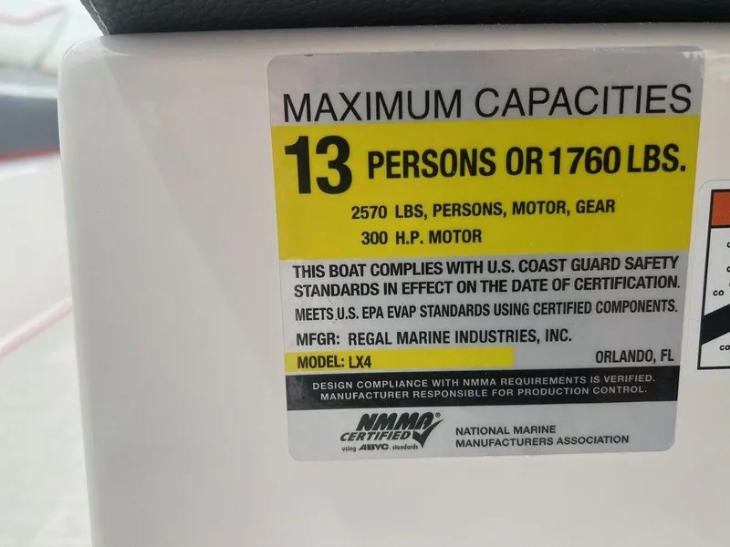 Slide: The Image of 2024 Regal LX4 boat capacity label: 13 persons or 1760 lbs, 300 HP motor. - 14