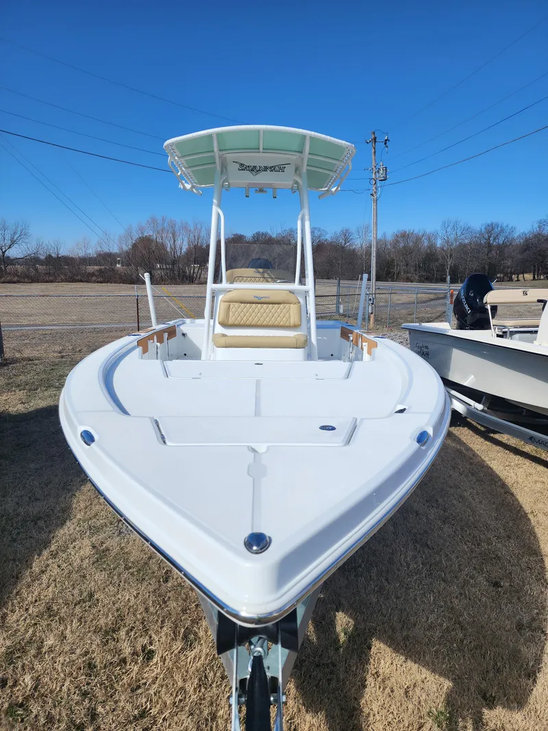 Slide: The Image of 2024 Savannah 220 IS boat on display, front view. - 15