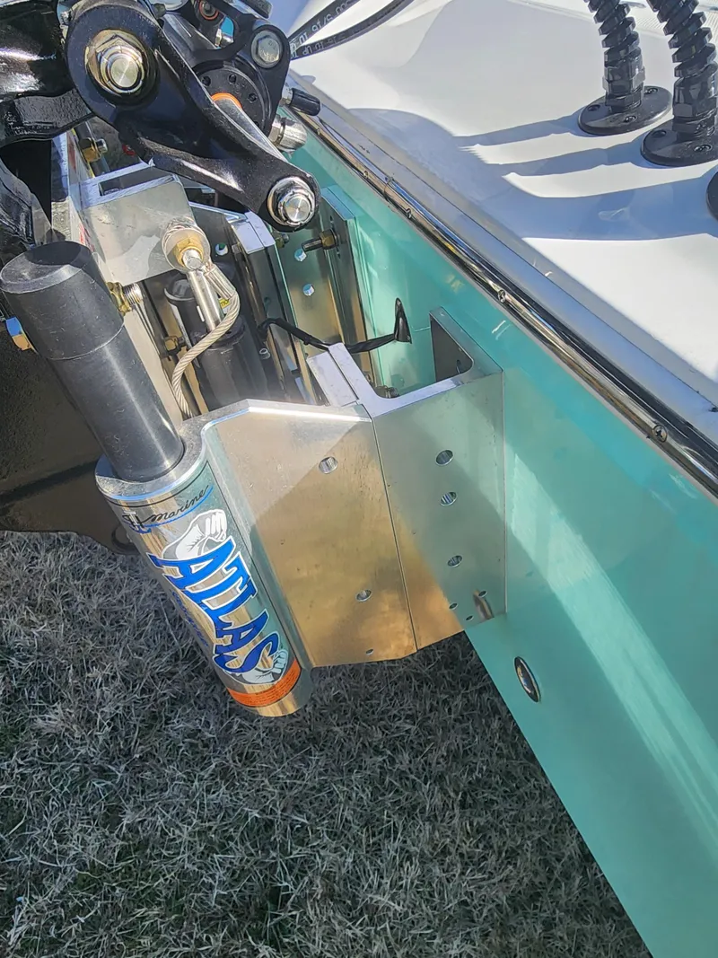 Slide: The Image of Close-up of 2024 Savannah 220 IS boat's hydraulic steering system. - 8