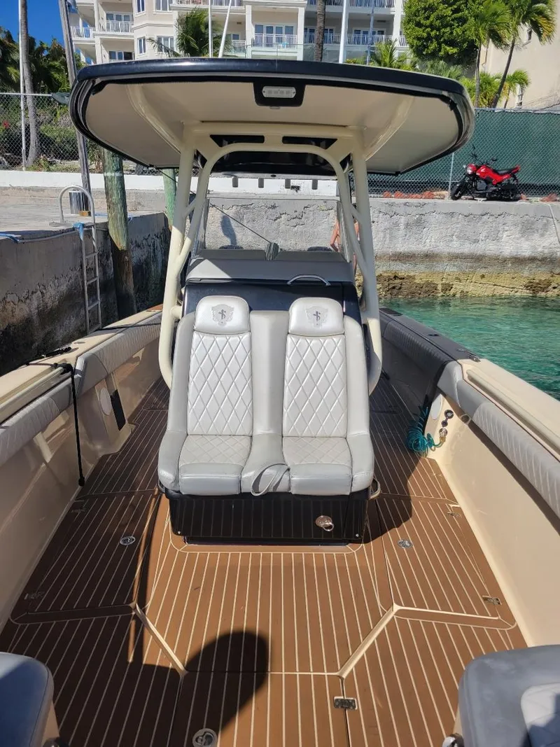 Slide: The Image of 2013 Statement 38 SUV Open boat with dual seats and teak flooring. - 4
