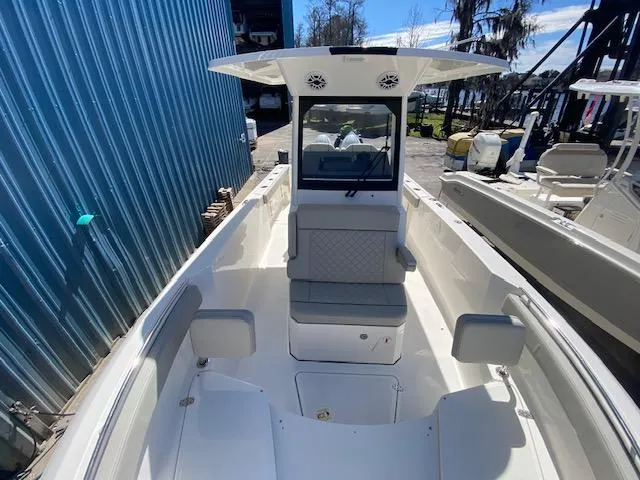 Slide: The Image of 2024 Pursuit S 268 boat interior with seating and console. - 24