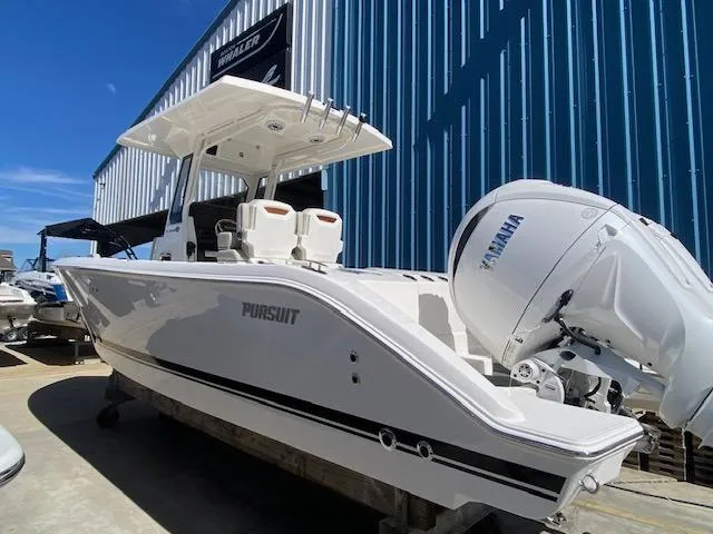 Slide: The Image of 2024 Pursuit S 268 boat with Yamaha engine in marina. - 8