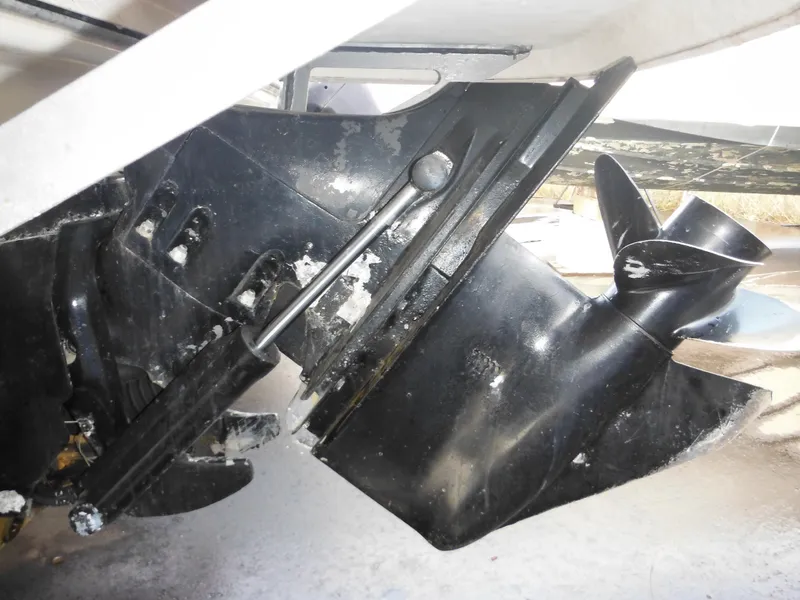 Slide: The Image of Close-up of the propeller and lower unit of a 2006 Larson SEi 180 Sport I/O boat. - 10