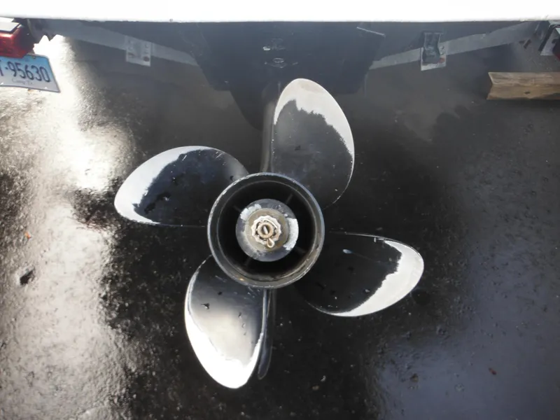 Slide: The Image of Propeller of a 2006 Larson SEi 180 Sport I/O boat. - 11
