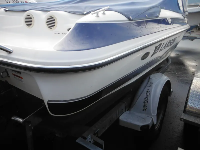 Slide: The Image of 2006 Larson SEi 180 Sport I/O boat on trailer, rear view. - 12