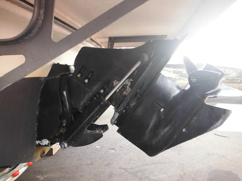 Slide: The Image of Close-up of the 2006 Larson SEi 180 Sport I/O boat's outdrive system. - 22