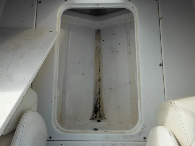 Slide: The Image of Storage compartment of a 2006 Larson SEi 180 Sport I/O boat. - 31