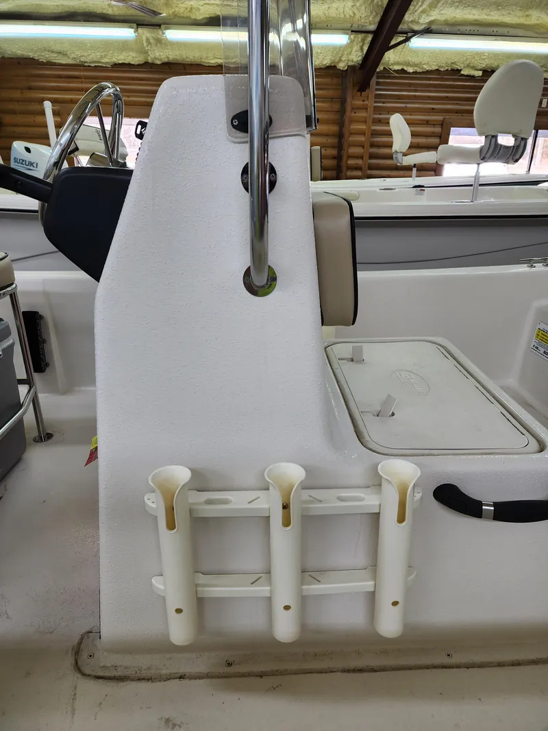 Slide: The Image of 2024 Carolina Skiff E18 JVX CC center console with rod holders. - 12