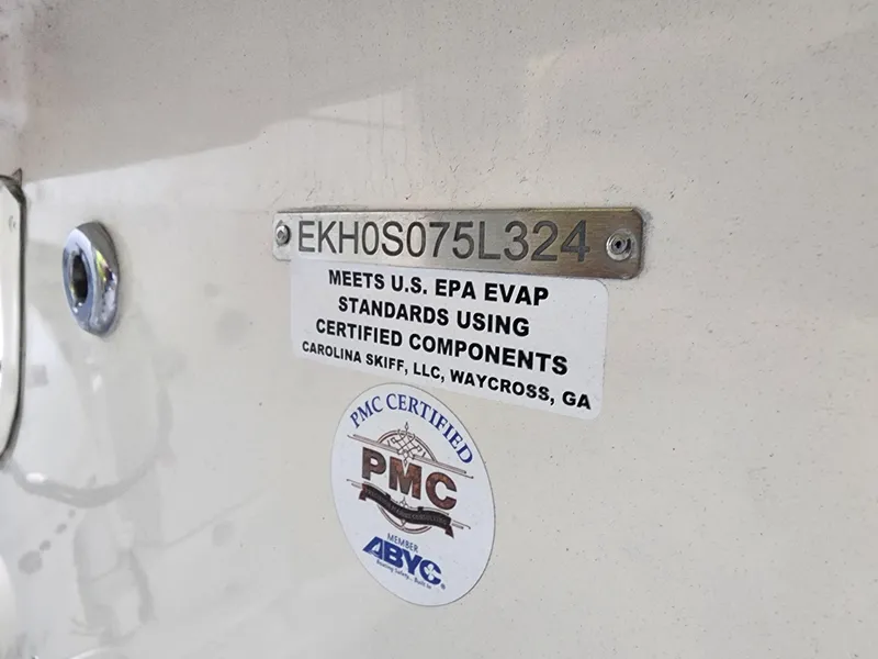 Slide: The Image of 2024 Carolina Skiff E18 JVX CC compliance label with EPA and PMC certification. - 6