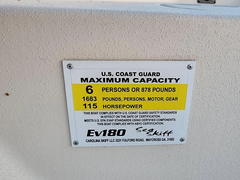 Slide: The Image of 2024 Carolina Skiff EV180 Sea Skiff capacity label, 6 persons, 115 horsepower, 1683 pounds. - 14