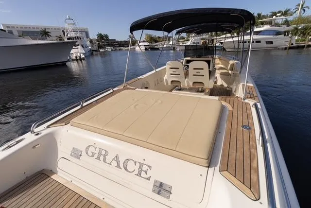 Slide: The Image of 2007 Novurania Chase boat named "Grace" docked, featuring spacious seating and elegant design. - 11