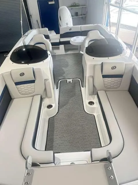 Slide: The Image of 2024 Hurricane 218 SS boat interior with spacious seating and modern design. - 8