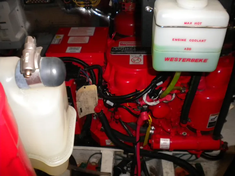 Slide: The Image of Engine compartment of a 2018 Regal 3300 Bow Rider with Westerbeke components. - 33