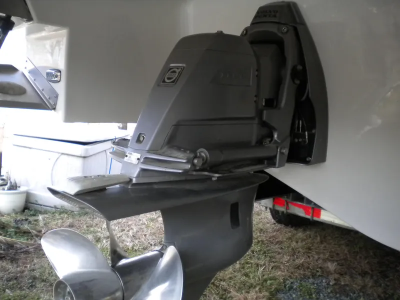 Slide: The Image of 2018 Regal 3300 Bow Rider boat's outboard motor and propeller detail. - 35