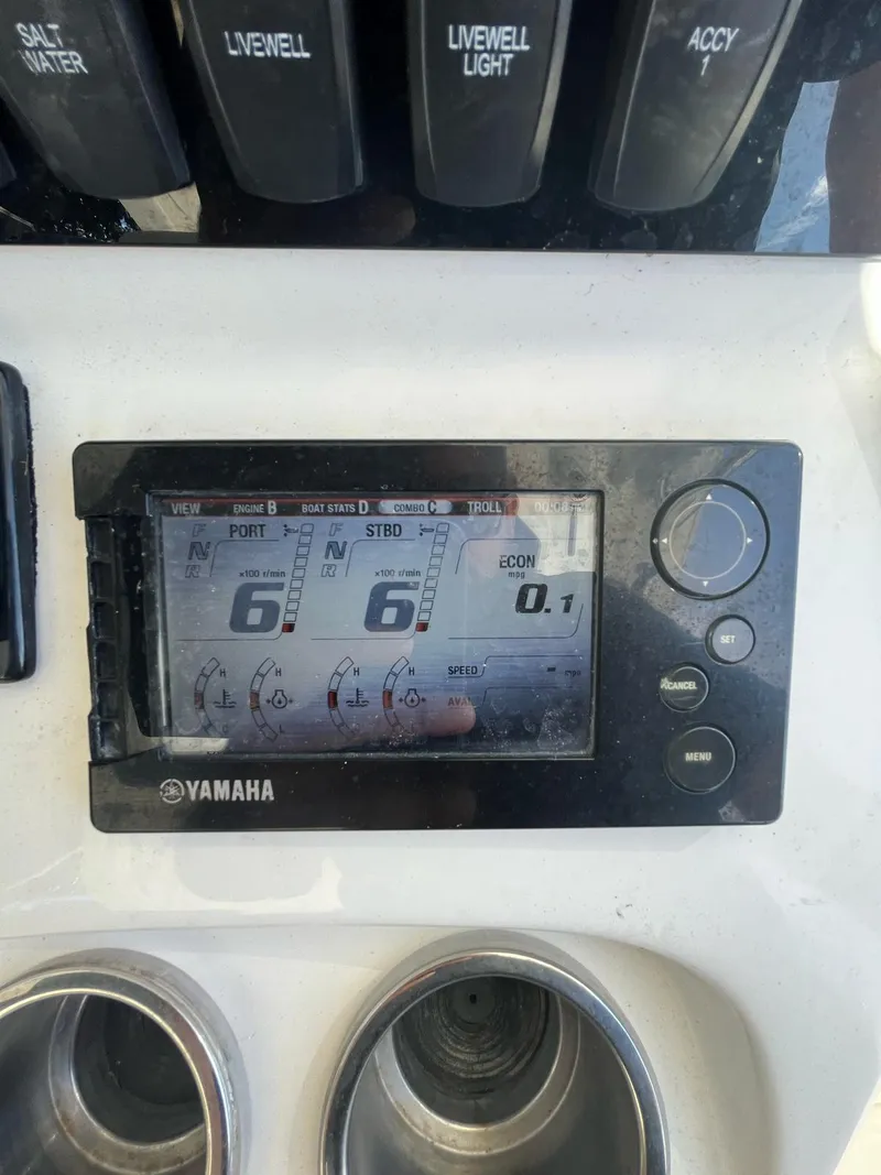 Slide: The Image of Yamaha display on 2006 Boston Whaler 320 Outrage Cuddy Cabin dashboard. - 11