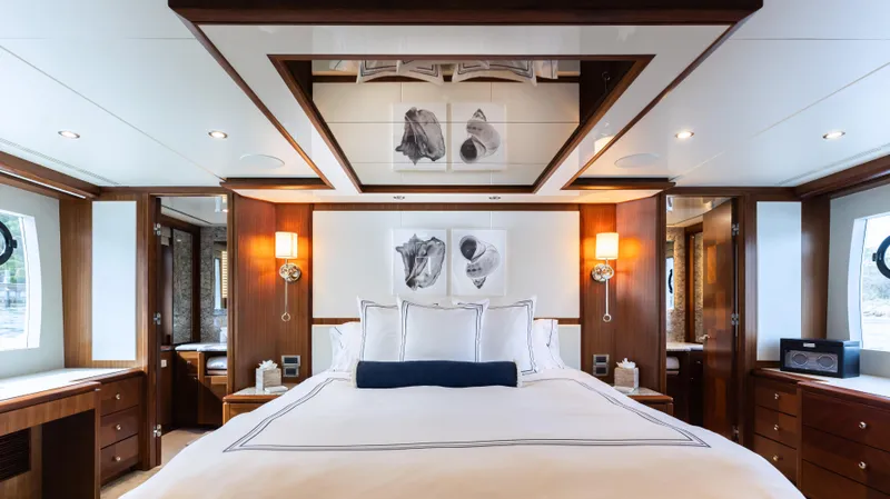 Slide: The Image of Luxurious bedroom interior of 2018 Ocean Alexander 85 E yacht with elegant wood finishes. - 12
