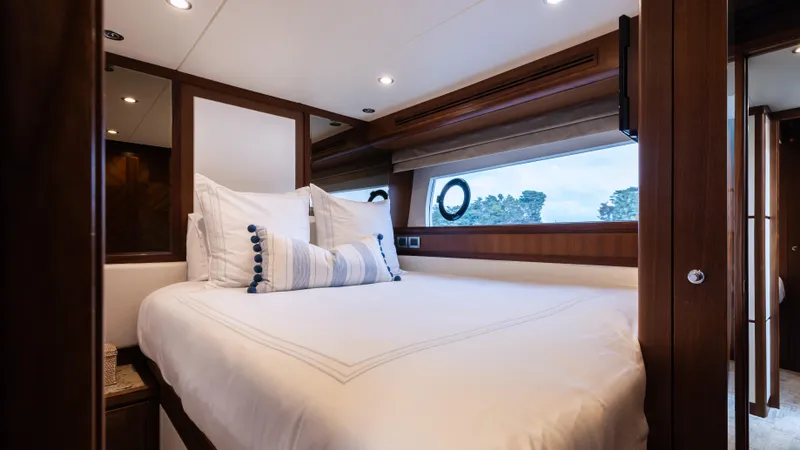 Slide: The Image of Luxurious bedroom interior of 2018 Ocean Alexander 85 E yacht with elegant bedding. - 16