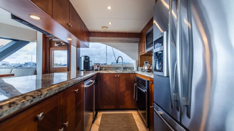 Slide: The Image of Luxurious kitchen interior of 2018 Ocean Alexander 85 E yacht with modern appliances. - 18