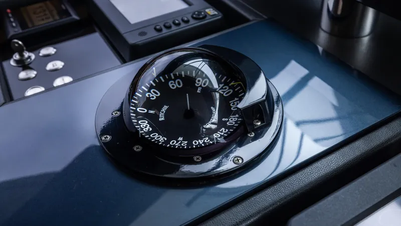 Slide: The Image of Compass on Ocean Alexander 85 E yacht dashboard, 2018 model, displaying navigation details. - 27