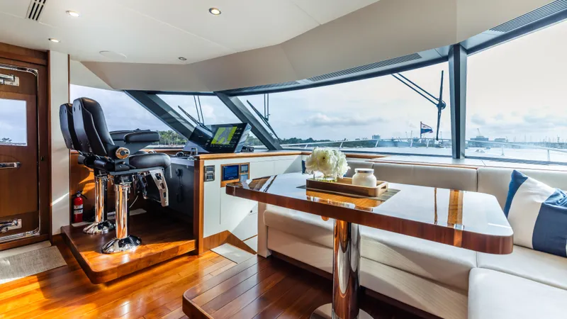 Slide: The Image of Luxurious interior of 2018 Ocean Alexander 85 E yacht with helm and seating area. - 30