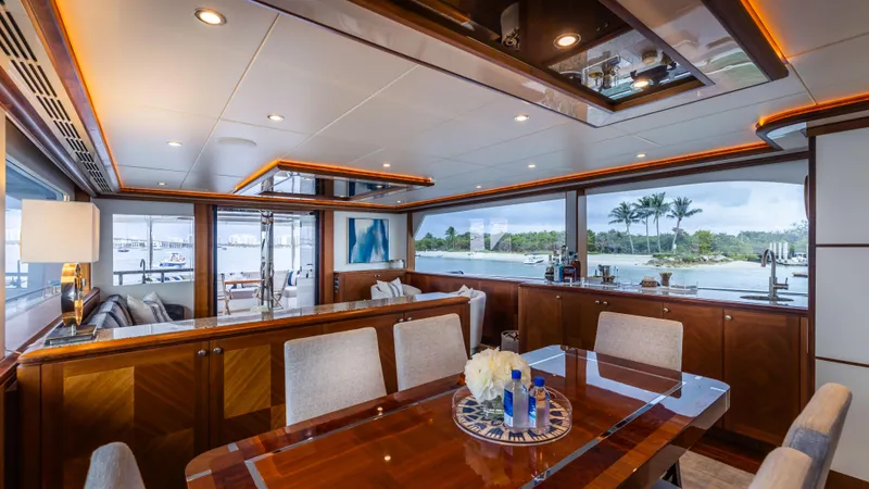 Slide: The Image of Luxurious interior of 2018 Ocean Alexander 85 E yacht with elegant dining area and scenic views. - 31