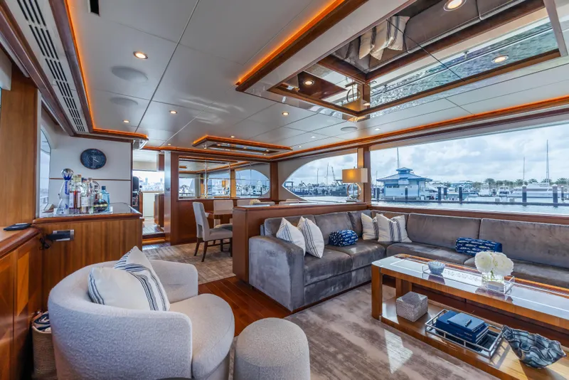 Slide: The Image of Luxurious interior of 2018 Ocean Alexander 85 E yacht with elegant seating and panoramic windows. - 33
