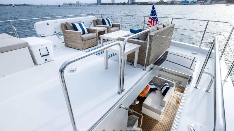 Slide: The Image of Luxurious 2018 Ocean Alexander 85 E yacht deck with elegant seating and ocean view. - 38